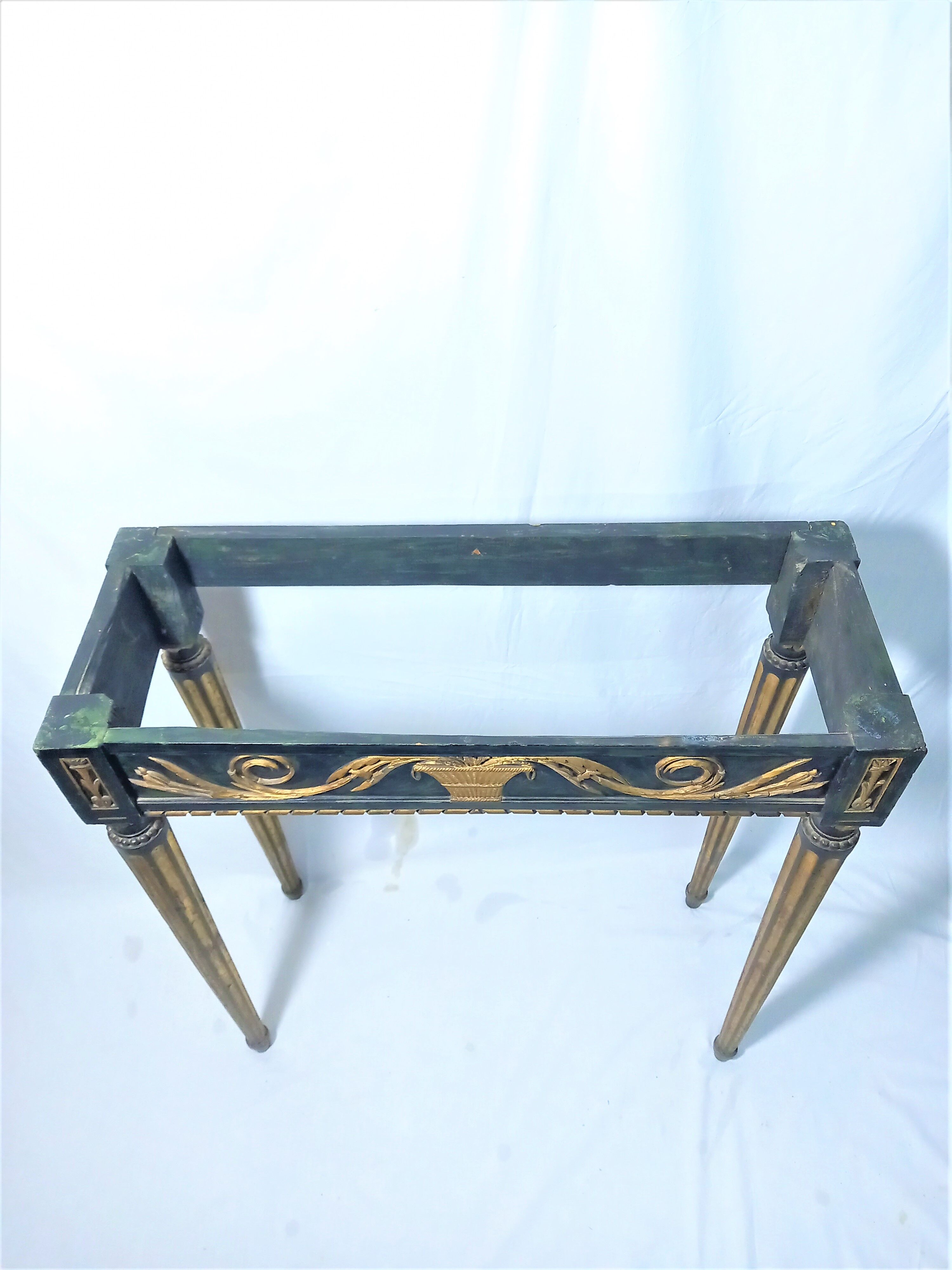19th century Louis XVI style console table in black and gold with white marble shelf