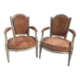 Paire de fauteuils de style Louis XVI en hetre patiné XIX siècle