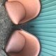 Lot of 2 armchairs and a sofa from Baumann in black wood and marble rose leather