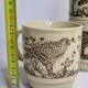 Ensemble de quatre mugs en grès émaillé à décor d'oiseau, made in england
