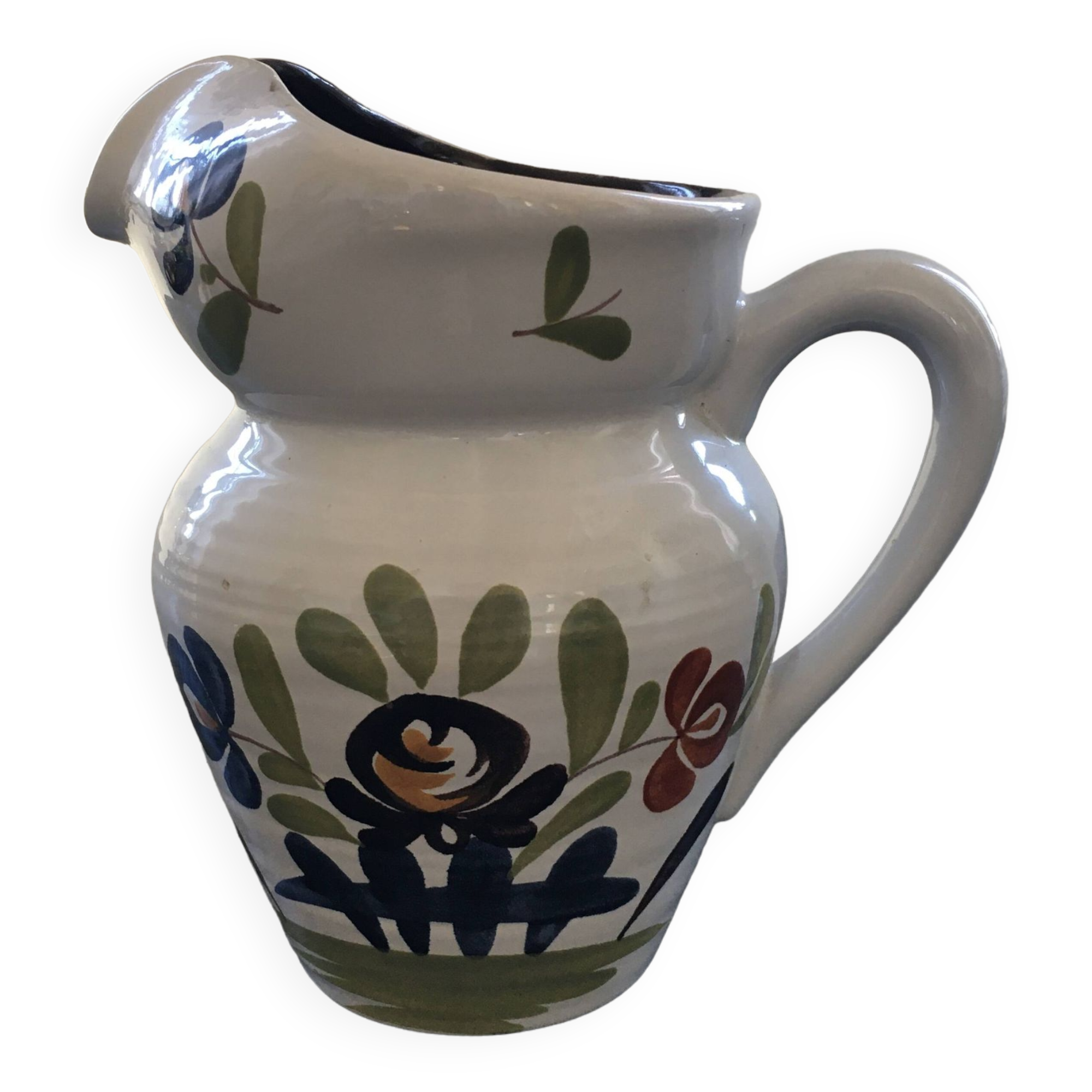 White pitcher with floral decoration