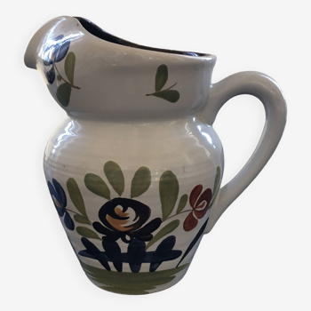 White pitcher with floral decoration