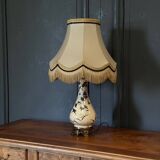 Porcelain lamp in the Indochinese style enhanced with gilding