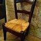 Child's straw chair and oak stool
