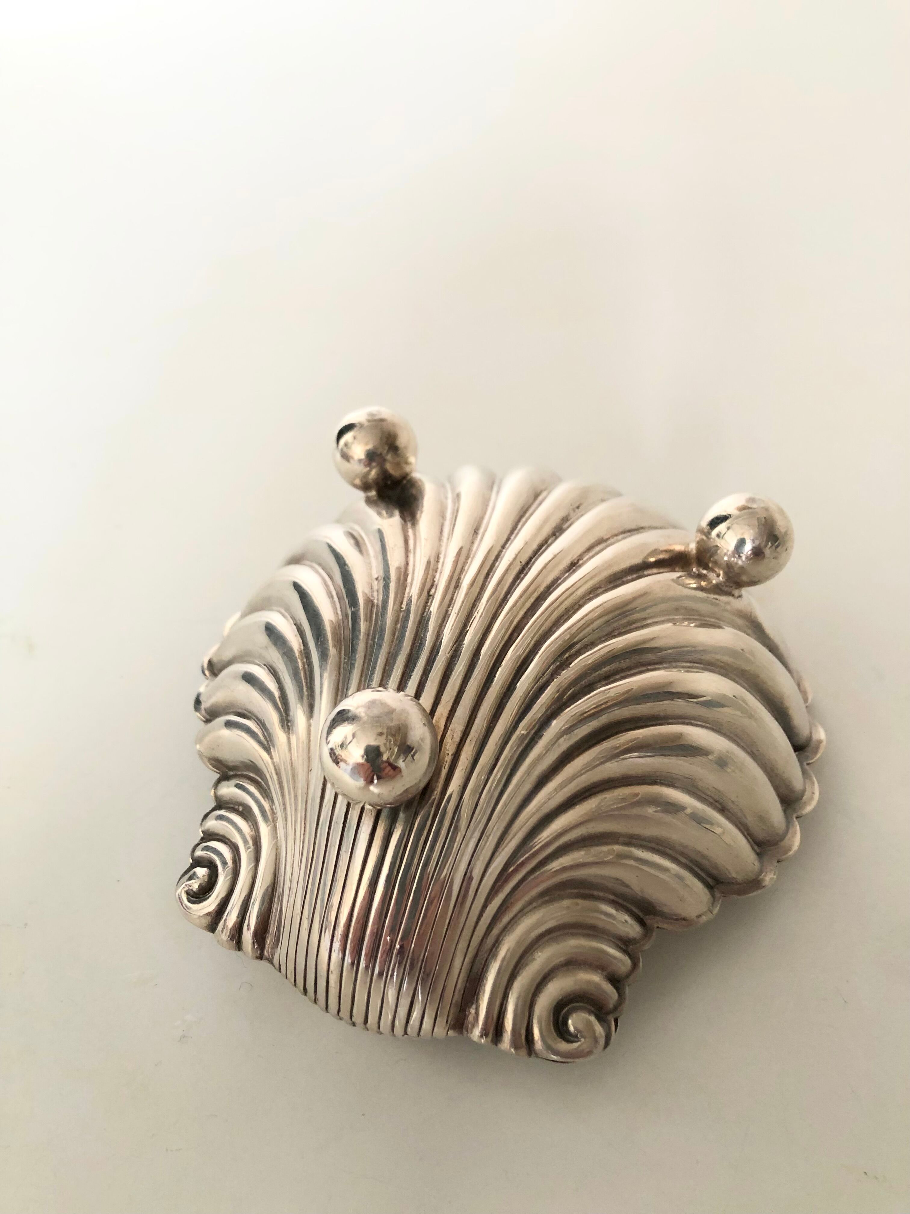 Silver metal shell cut