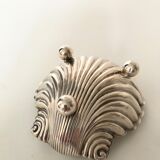 Silver metal shell cut