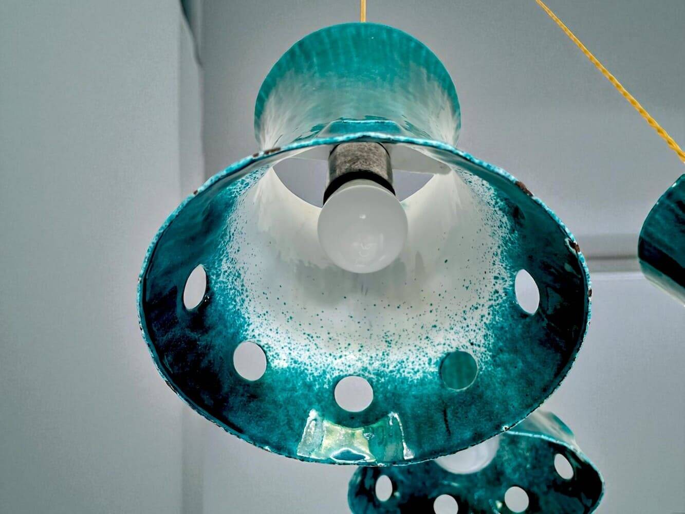 Green cast iron cascading chandelier