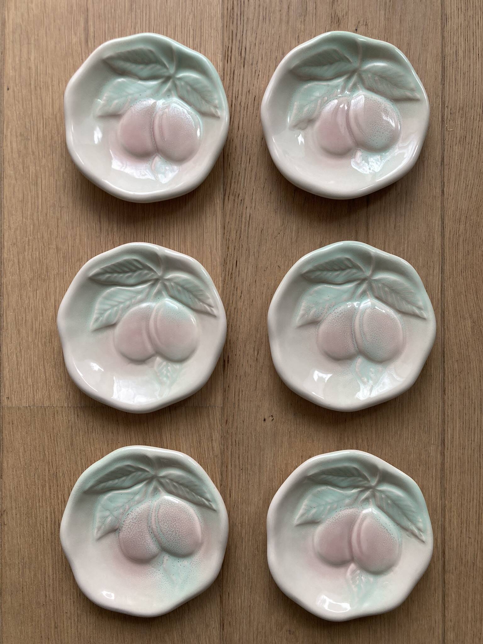 6 small ceramic plates