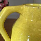 Old yellow ceramic pitcher