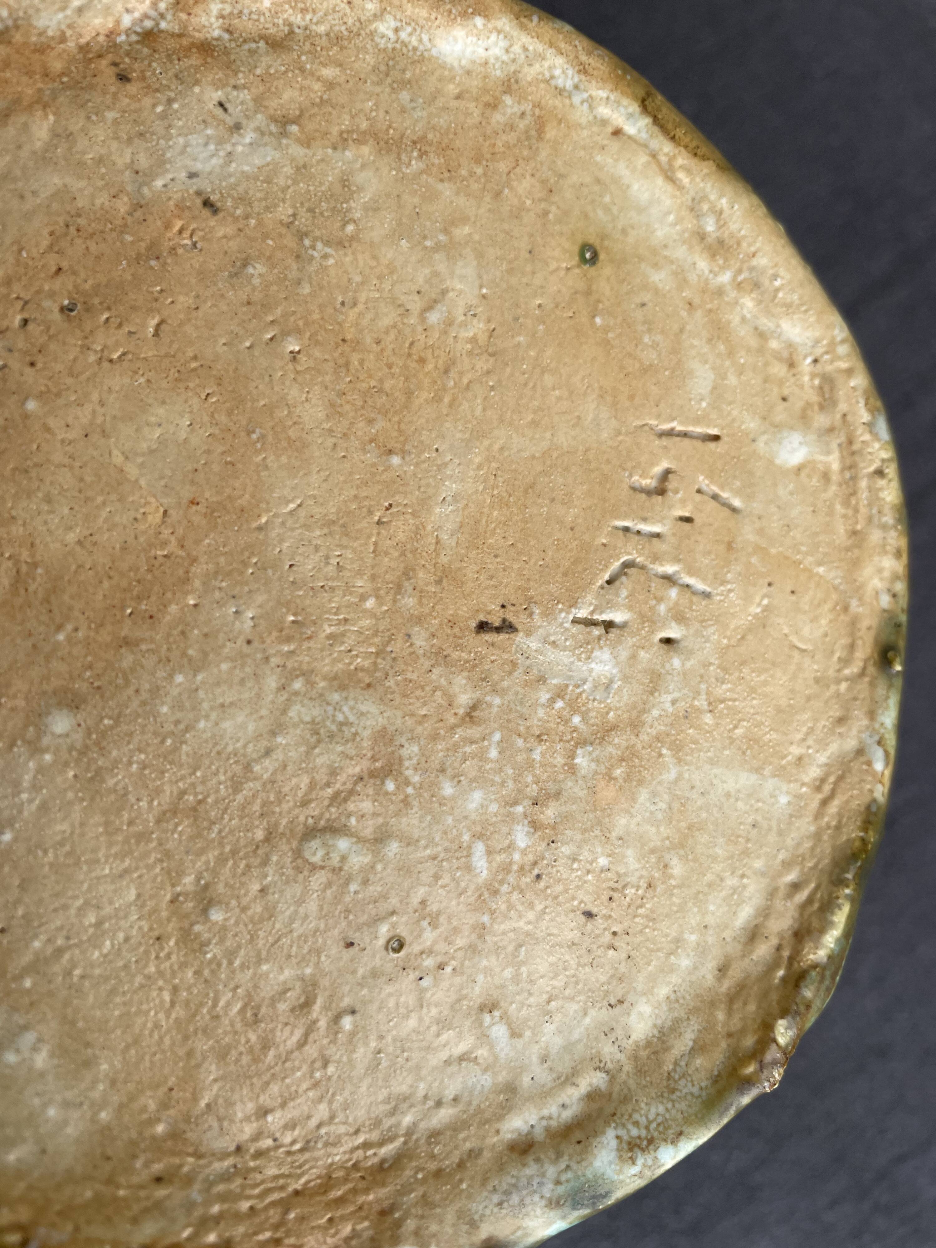 Stoneware bowl with handles, signed handmade ceramic.