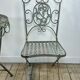 Patinated green folding wrought iron garden set with 1 table + 2 chairs.