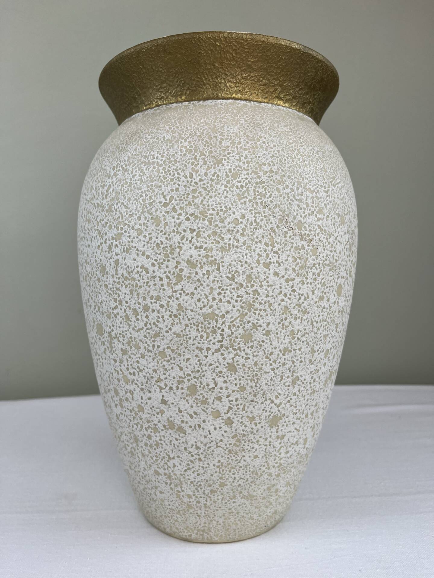 Cream speckled glazed vase with a gold rim, 1970s.