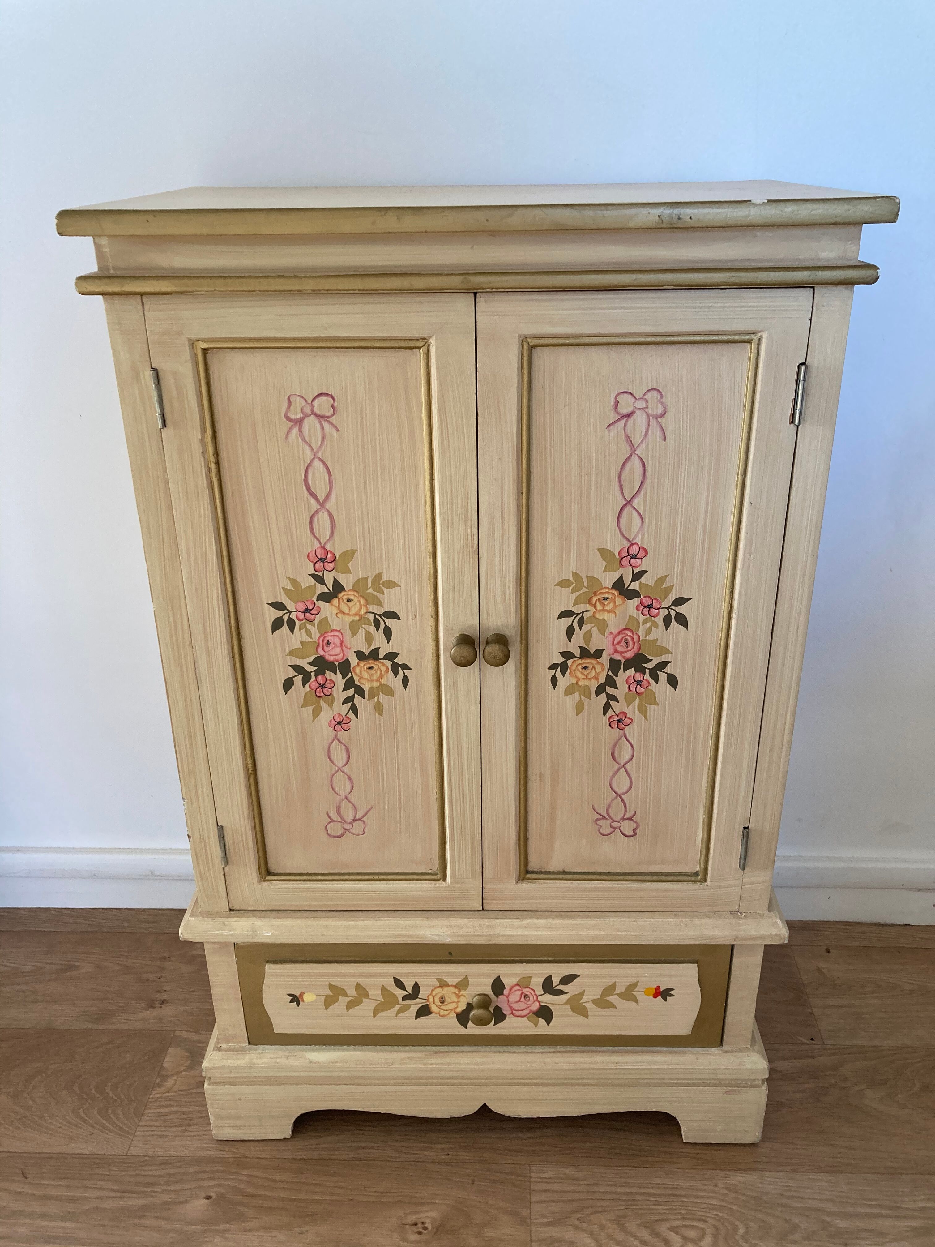 2-door flowered wooden cabinet