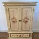 2-door flowered wooden cabinet