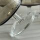 5 smoked glass dessert bowls.