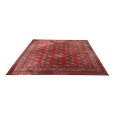 Tapis persan en laine rouge bordeaux Louis de Poortere 250x350cm