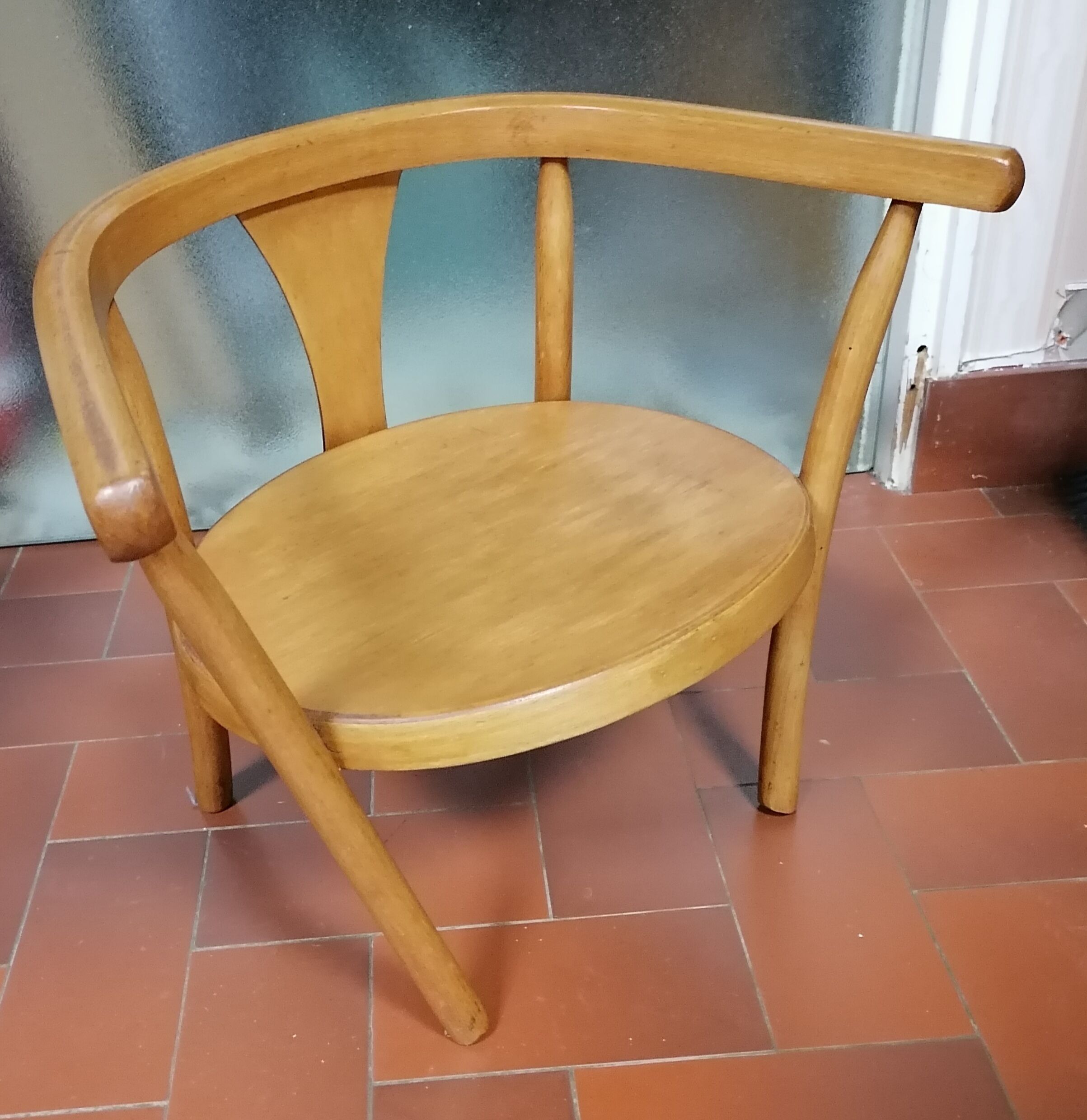 Curved wooden children's chair