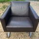 Fauteuil en cuir piétement metal