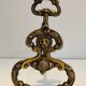 Pair of neoclassical andirons in bronze and wrought iron