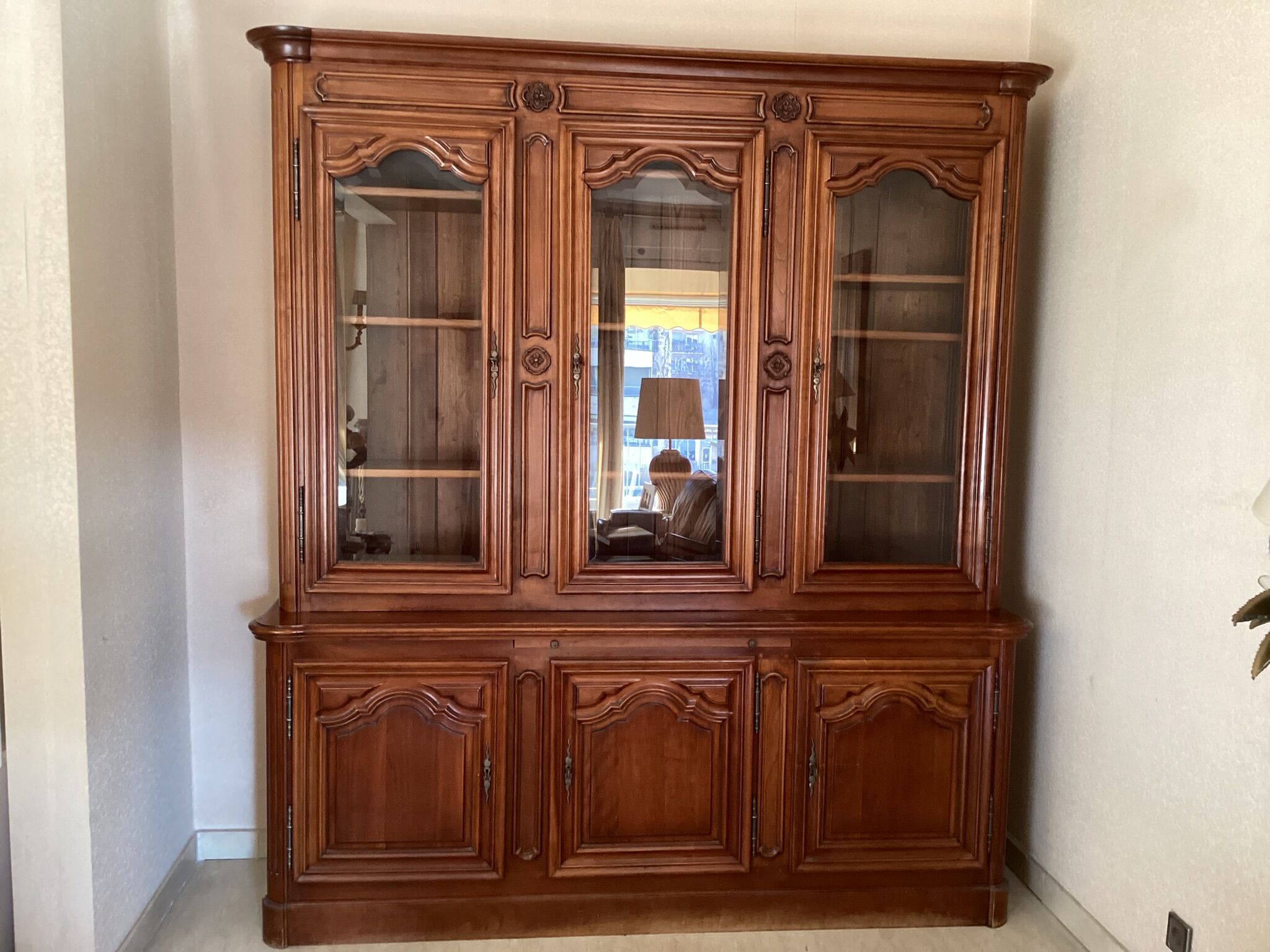 Cherry bookcase stamped Louis Tricoire