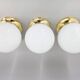 Set of three mid-century brass and milk glass ceiling ligts, restored