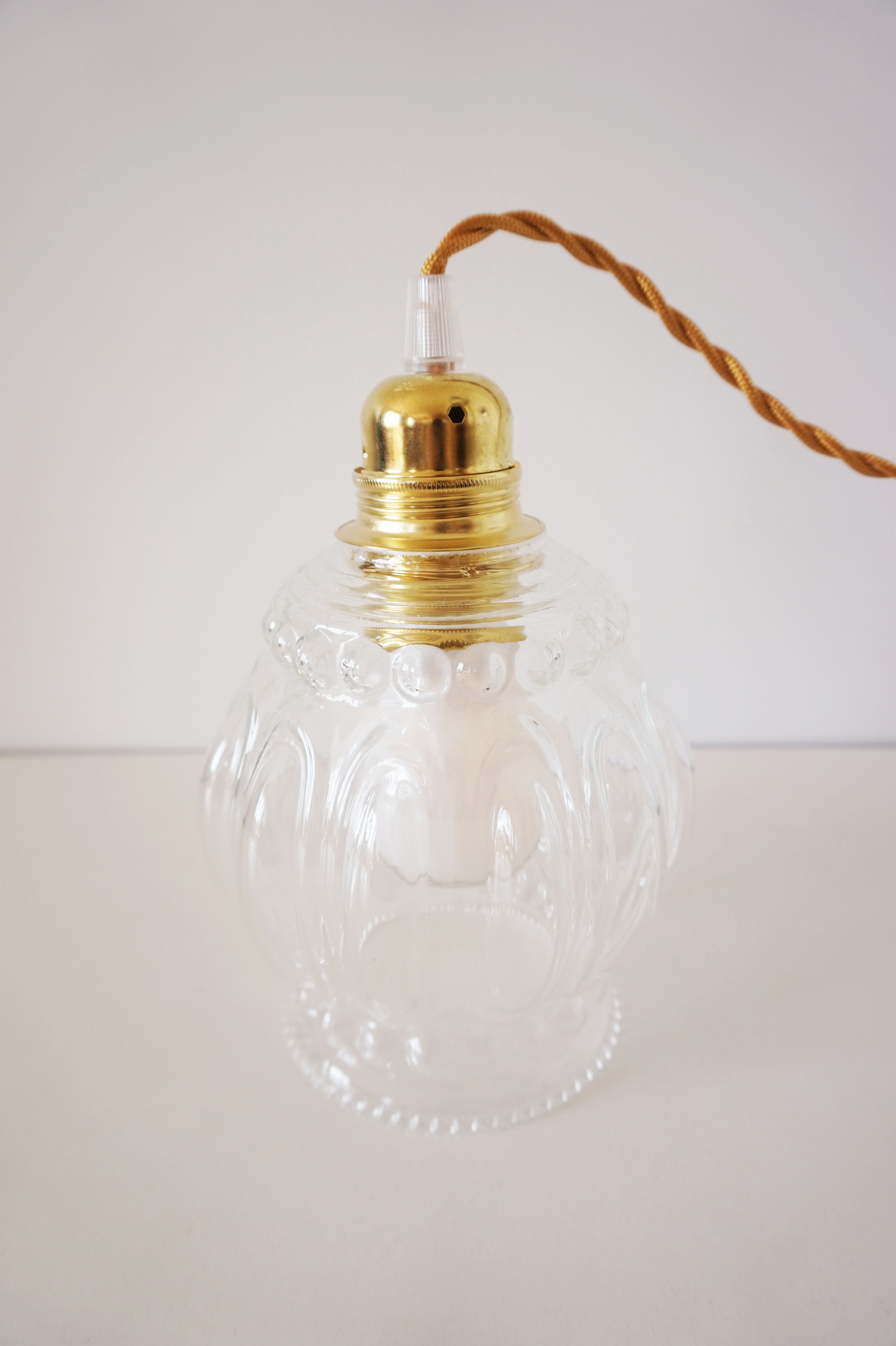 Suspension molded glass globe player