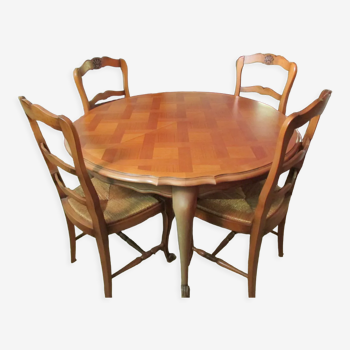 Table extensible et 4 chaises paillées, en merisier
