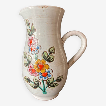 Vintage ceramic pitcher with flowers