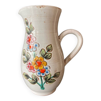Vintage ceramic pitcher with flowers