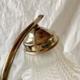 Old brass accent lamp in the shape of a flower