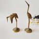 Brass heron duo