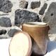Trio of stoneware pots with lids