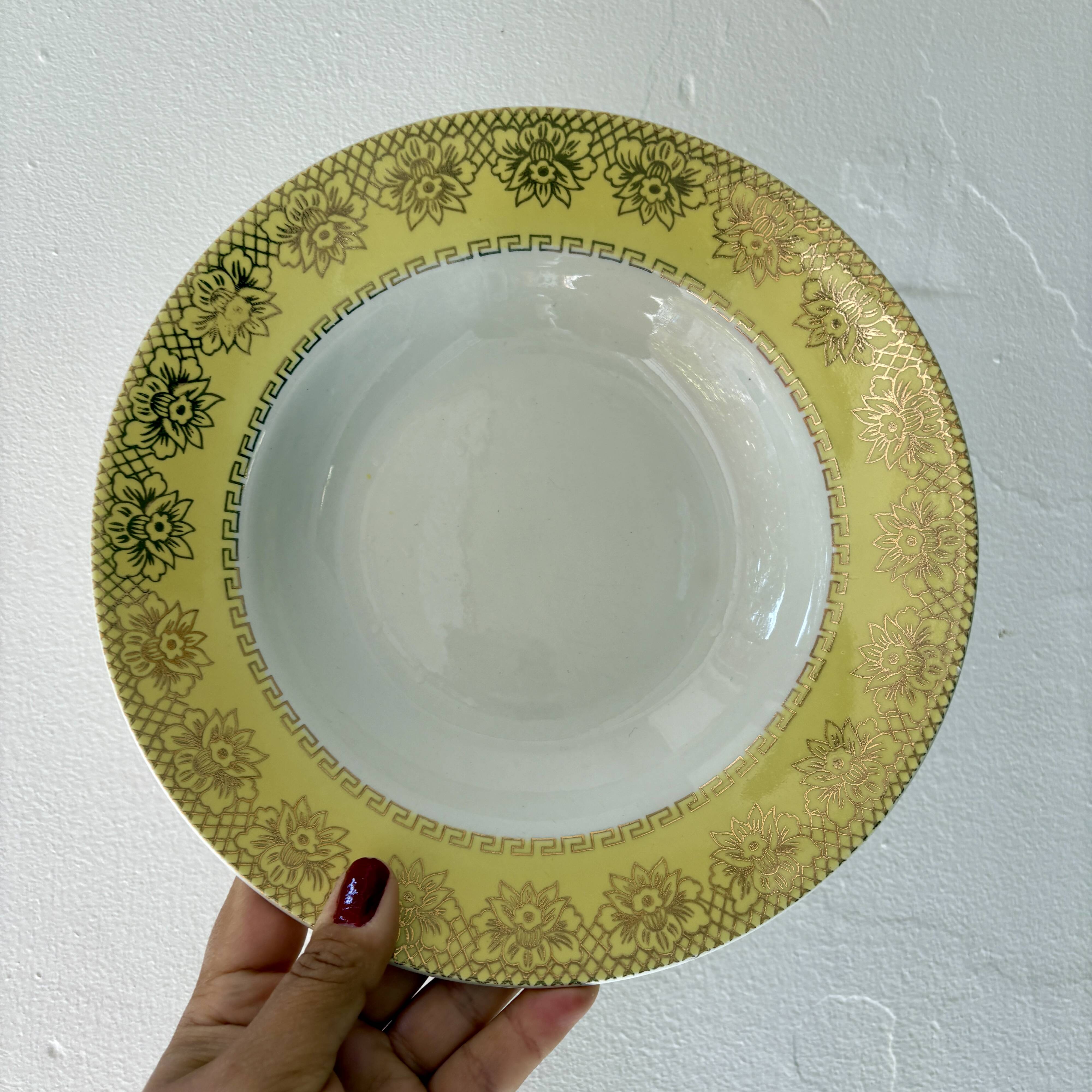 Set of 12 vintage yellow, white and gold soup plates