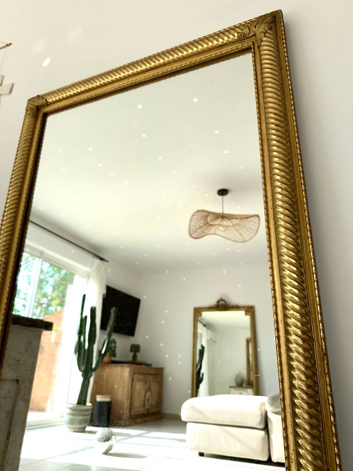 19th-century antique gilded mirror.