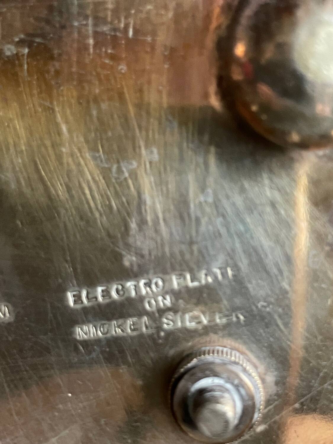 Antique egg set in nickel silver metal