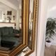 Octagonal mirror with bevelled parcloses, Neo-Classical Regency Art style.