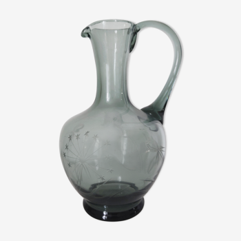 Engraved glass pitcher