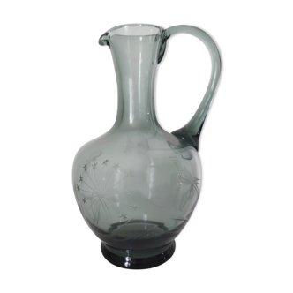 Engraved glass pitcher