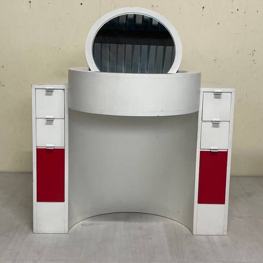 Bathroom toilet with a 70s pouf.