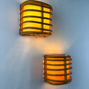 Pair of mid-century rattan wall sconces, 1960s, Italy