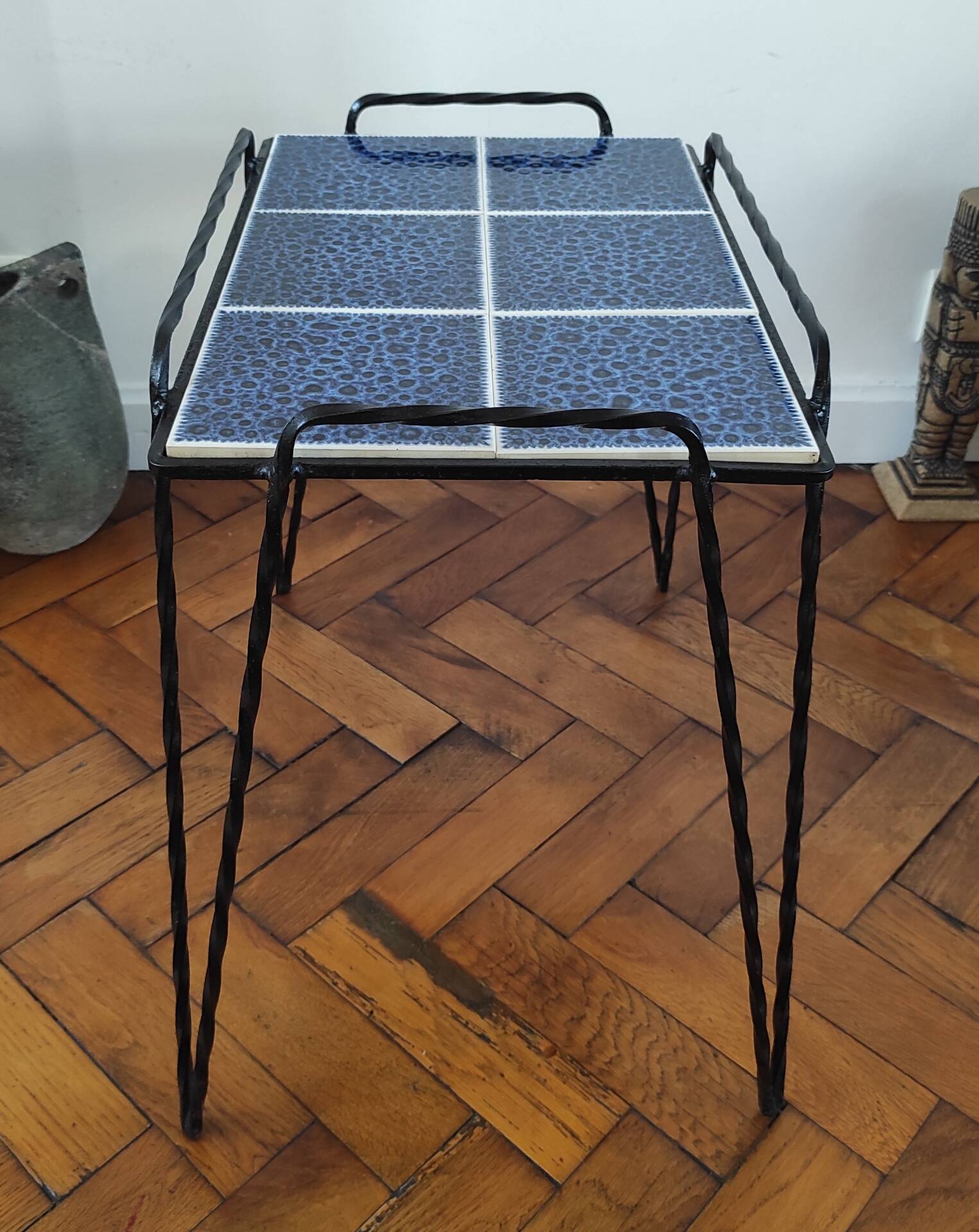 Vintage side table in twisted wrought iron and glazed ceramic.