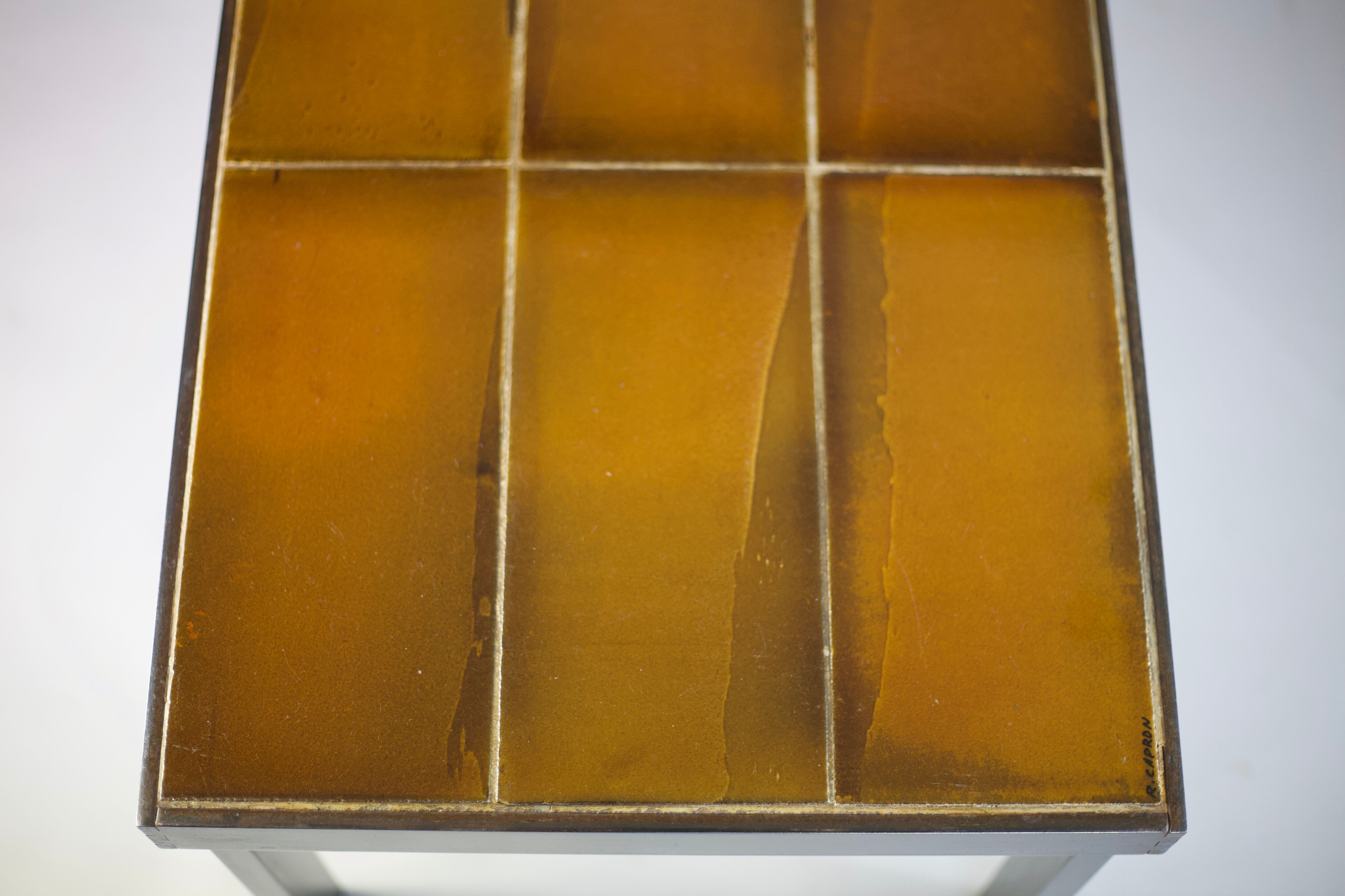 Coffee table signed Roger Capron, steel and ceramic, bird motif