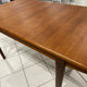 Large extendable Scandinavian table in vintage teak from the 1970s.