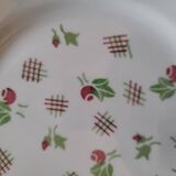 11 dinner plates decorated with stylized roses. 1950s. 11 dinner plates