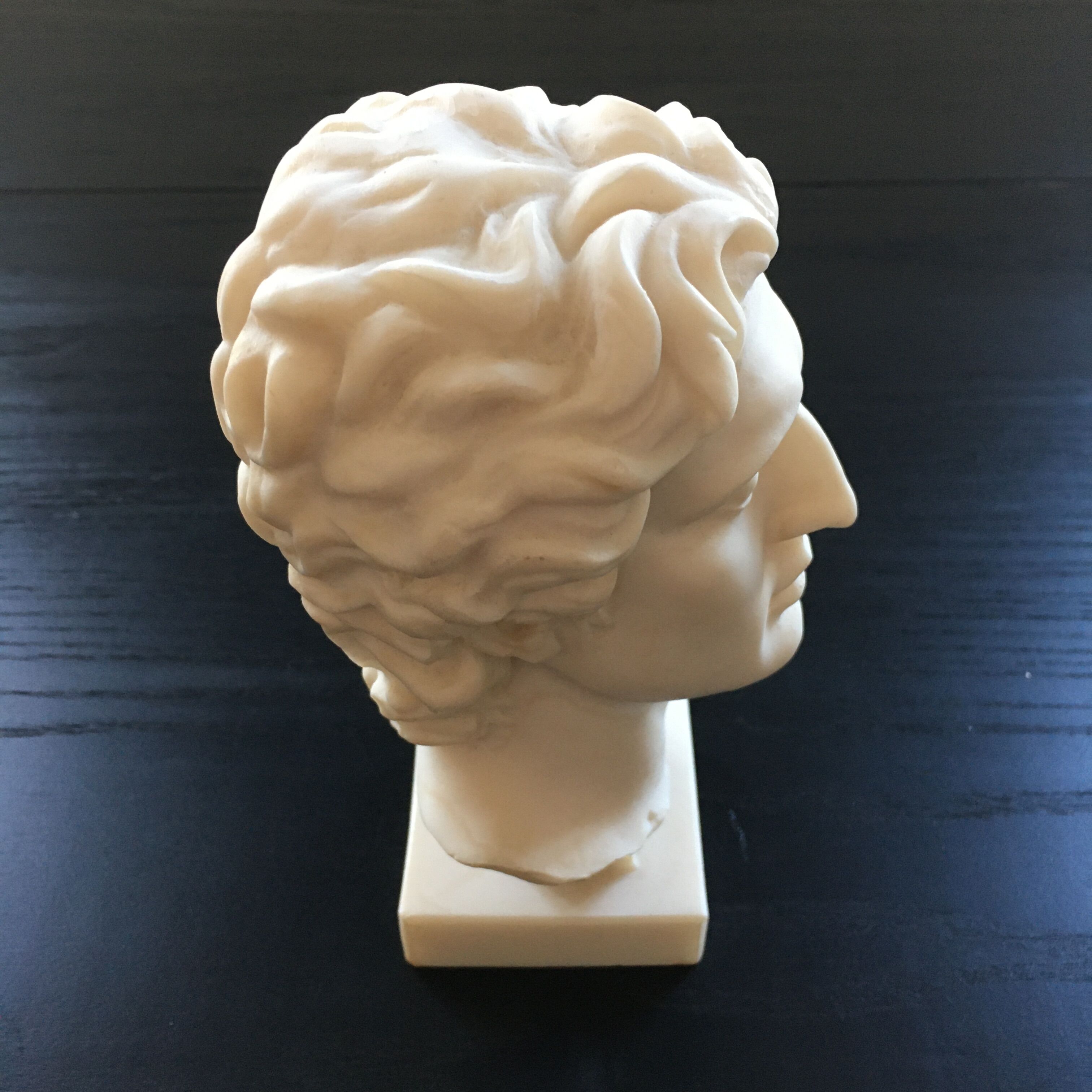 Bust Greek alabaster god