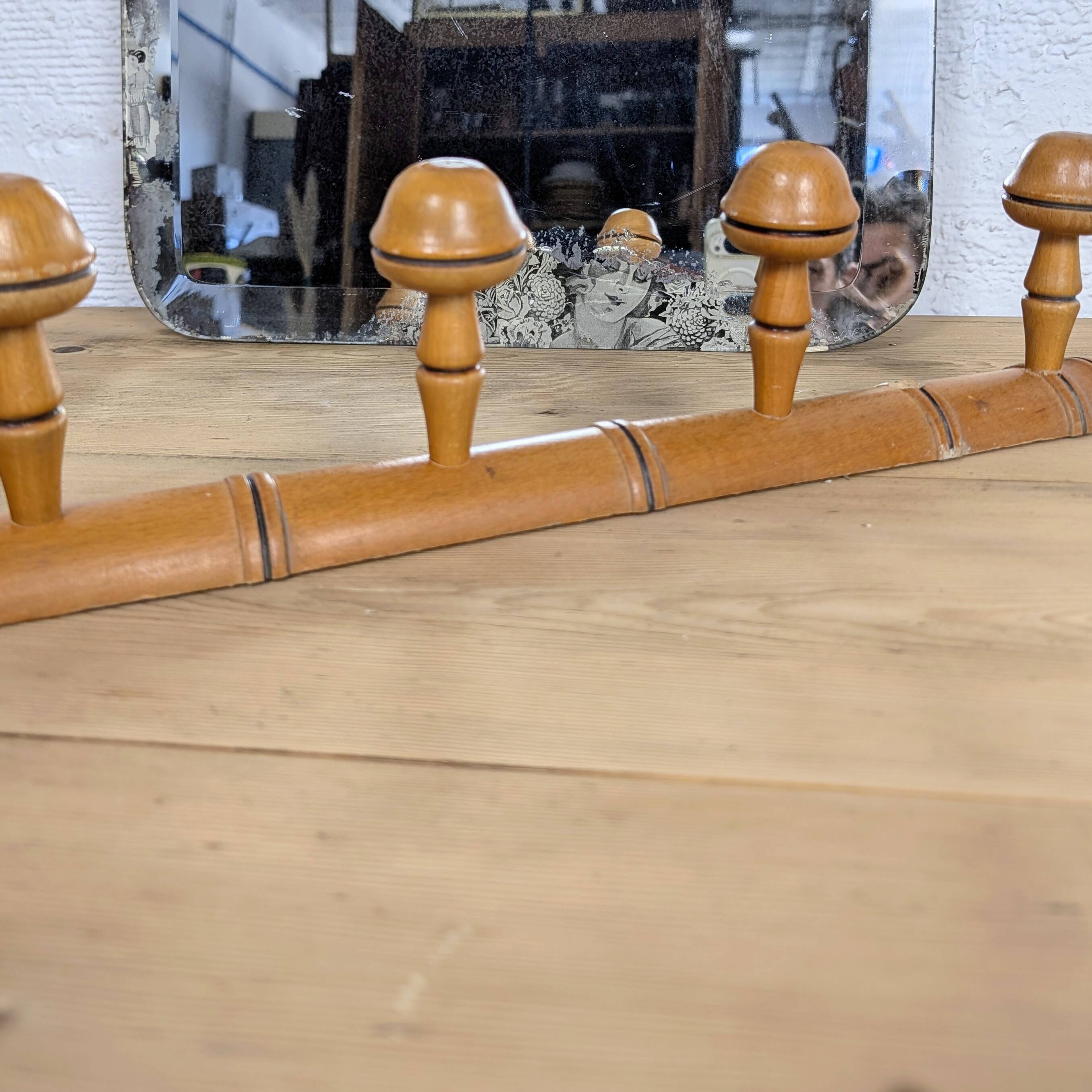 Turned wooden coat rack