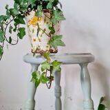 Antique tripod stool made of solid wood in blue.