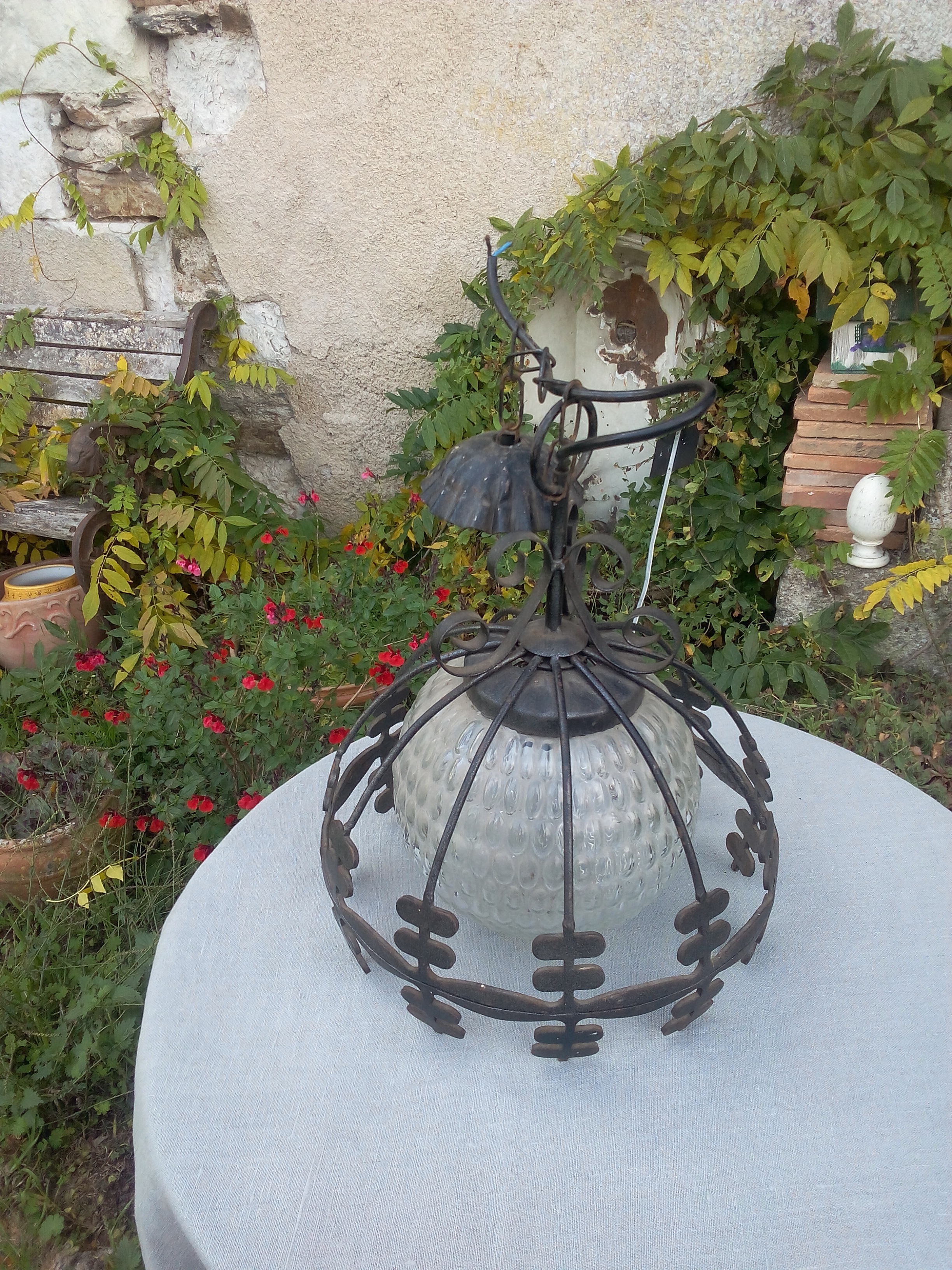 Industrial glass and wrought iron lamp