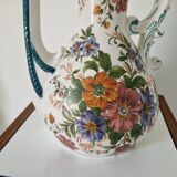 Old jug in flowered porcelain