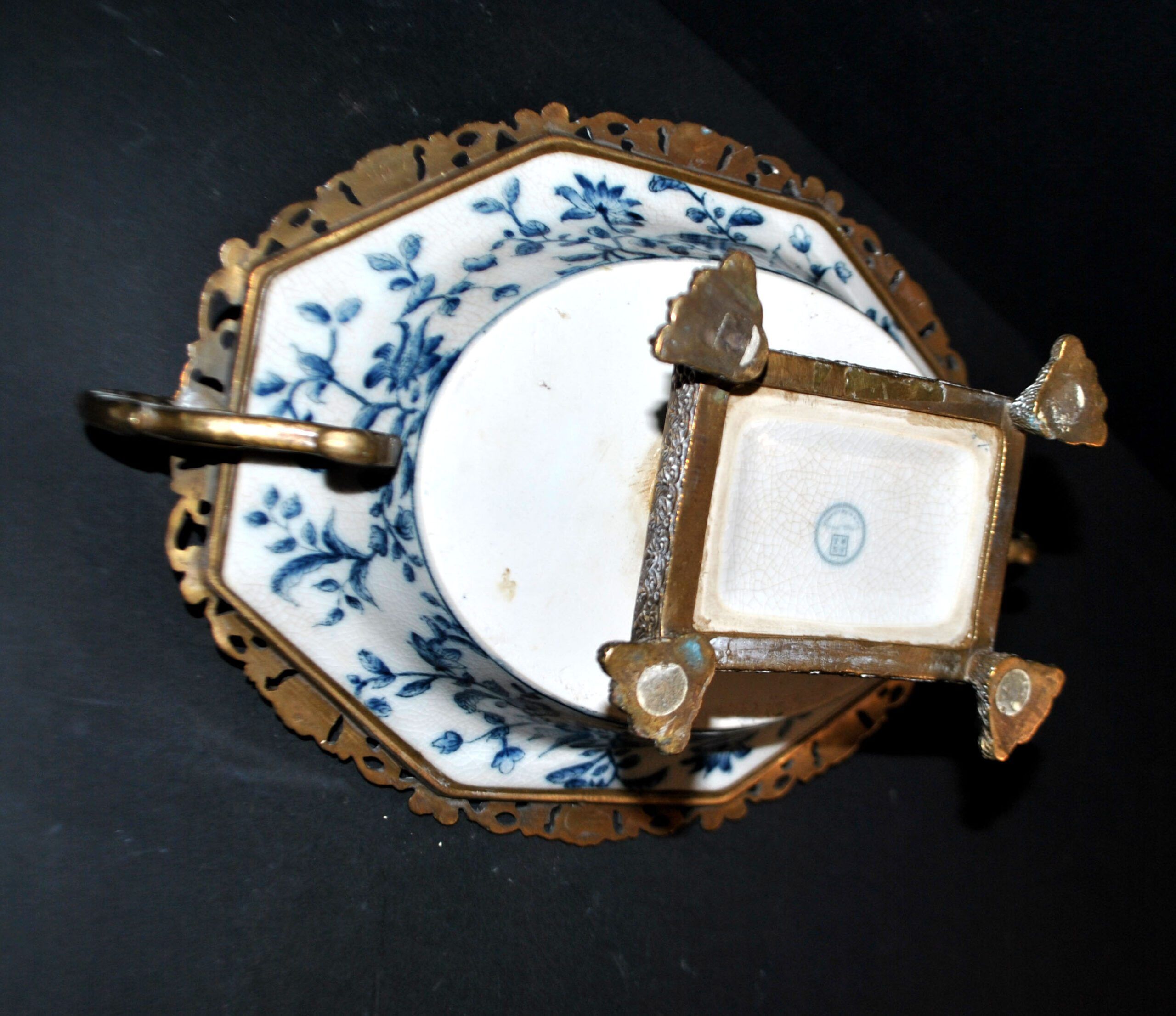 Blue Chinese floral porcelain coupe on a bronze base table centrepiece.